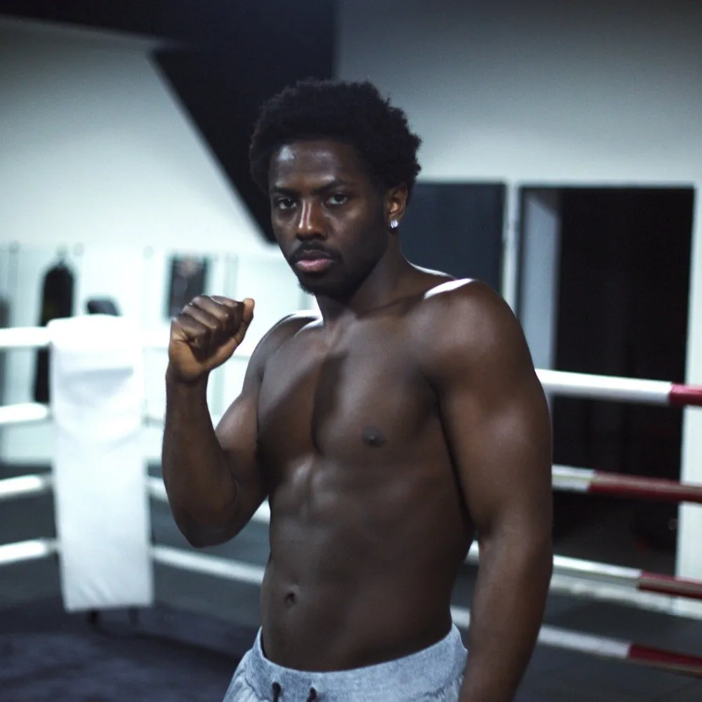 John ‘The Dog’ Dagrin in a boxing stance in the gym
