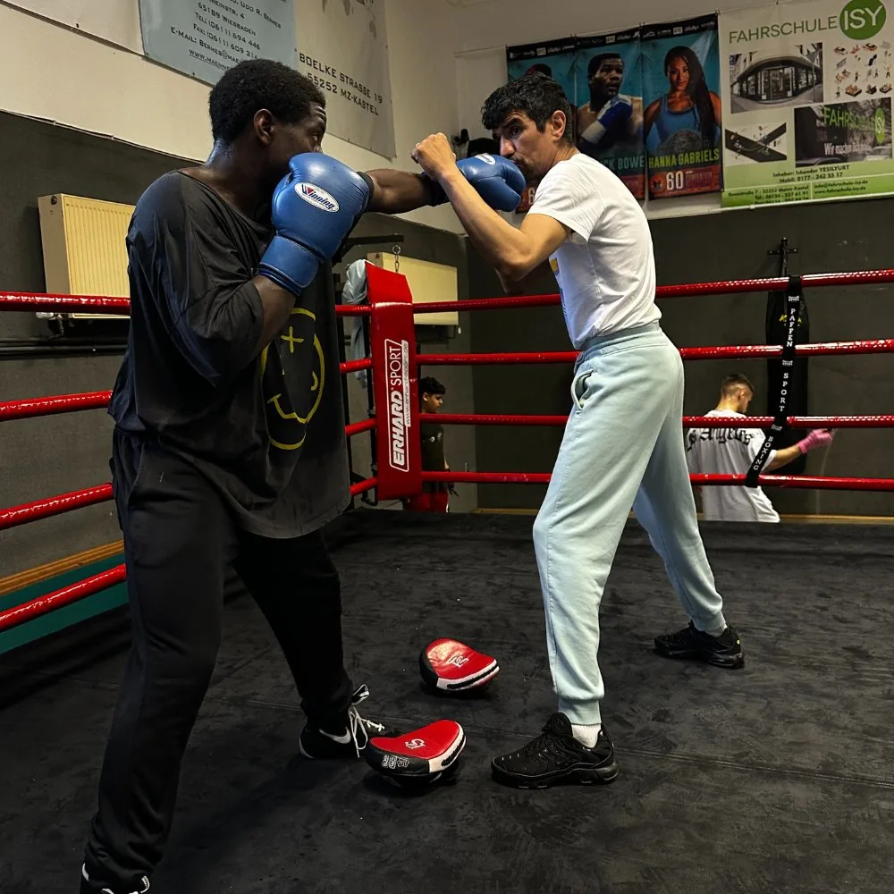 John ‘The Dog’ Dagrin training on the pads with his coach